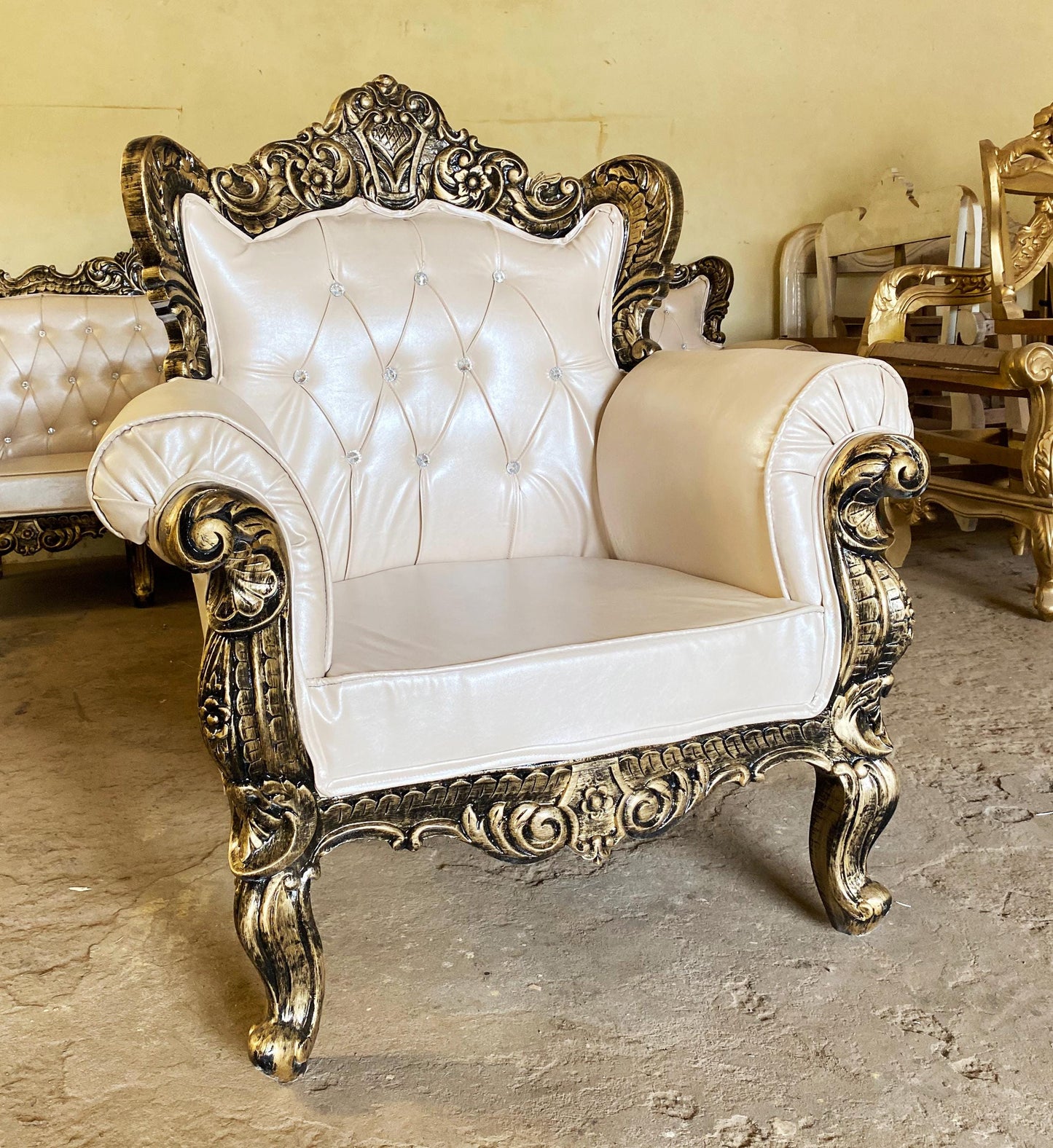 Hand Carved Louis XVI Sofa: Rustic Gold Teak, Cream Upholstery